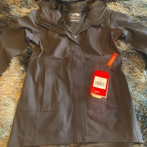 Black North Face lightweight jacket with hood and “DryVent” technology